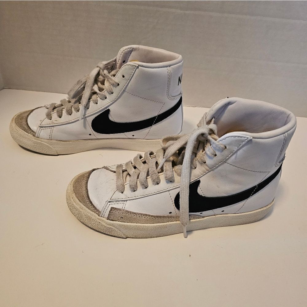 Nike leather hi top sneakers size 6. White with black swish